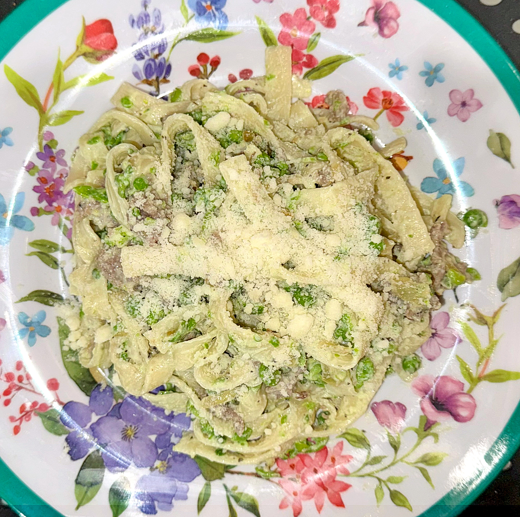 Sweet Sausage & Smashed Pea Tagliatelle with Ricotta